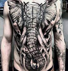 Top 71 Cool Chest Tattoo Ideas 2021 Inspiration Guide Cool Chest Tattoos Chest Tattoo Elephant Elephant Tattoos