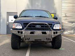 Want to lower your truck and get rid of all that wheel well space? 10th Gen F 150 High Clearance Front Bumper Kit Coastal Offroad
