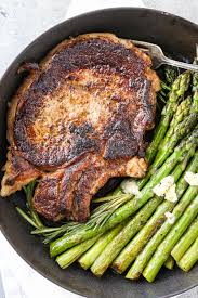 Place the cast iron skillet on the burner set to high heat and allow to heat up. Perfect Cast Iron Ribeye Momsdish
