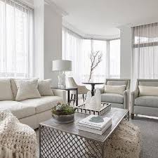 Far from being boring, using grey allows for serene designs that can simultaneously boast sophistication and can also develop looks that are bold, steely, and. Light Ivory Theme Living Room Design Ideas