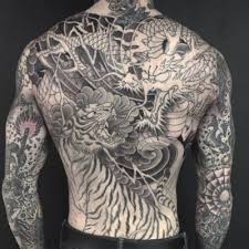 In buddhism, such ink represents wisdom, enlightenment and spiritual awakening. Tattoodo In 2021 Chris Garver Tattoo Tiger Tattoo Sleeve Japanese Tattoo