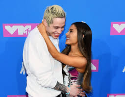 He was raised on staten island, new york, and is the son of amy (waters) and scott matthew davidson. Ariana Grande Fans Things She Shaded Pete Davidson In Positions Hellogiggles