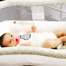 Dianichka85 Writes Dockatot Has Been Very Useful I Can Even Put In Her Halo Bassinet So She Can Sleep Comfy Halo Bassinet Baby Bassinet Modern Baby Gear