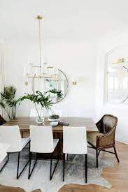 Wall Colour And Light Fixture Overall Look With Creamy White And Pops Of Green With The White Dining Room Dining Room Inspiration Interior Design Dining Room