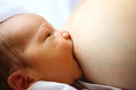 Take off their clothes and socks. Keeping Baby Awake While Breastfeeding