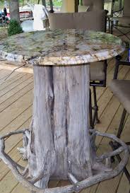 Tree Trunk Bar Table With Granite Top Notice The Foot Rest My Hubby Made It Stump Table Outdoor Tree Stump Table Table