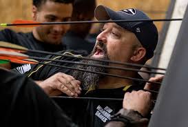 Team Army Archery Coach Frank Barroqueiro coaches a