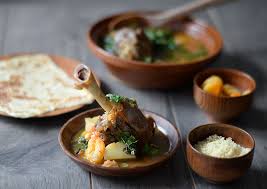 Lamb shank tagine with couscous. Lamb Shank Tagine