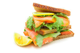 Slice the bagels through the center, sandwich fashion. Sandwich With Smoked Salmon Salad And Lemon Stock Photo Image Of Baked Goods 118280216