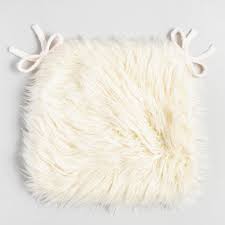 ivory mongolian faux fur chair cushion white acrylic by world market in 2021 fur chair chair cushions desk chair cushion