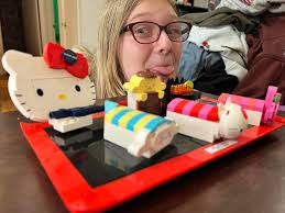 Daughter completes 383pc Hello Kitty sushi bar brickcraft set