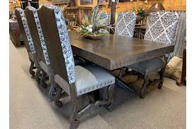 Modern metal base dining table. Luxury Dining Tables Rustic Dining Tables Hat Creek Interiors