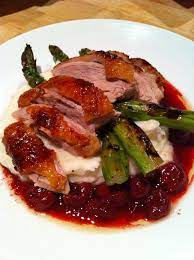 Glazed Duck Over Mashed Potatoes And Grilled Asparagus Duck Recipes Best Duck Recipe Cherry Sauce