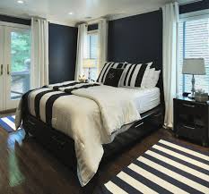 Here's another beautiful room with lighter walls and rich navy accents. Navy And White Bedroom Novocom Top
