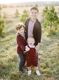 If your setting is already bright and seasonal, opt for neutral outfits that let your family shine. Christmas Cards Family Photographers Nashville Blog Nashville Family Photographers Jenna Henderson Baby Family Portraits