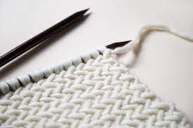 The herringbone stitch row 1 cast on as many stitches as you need knit 1 slip 1 purl wise knit 1 yo pass the slipped stitch over both stitches all the way across k1 row 2 purl two together but don't remove the stitches purl once again. How To Knit Herringbone Stitch Wool And The Gang Blog Free Knitting Kit Patterns Downloads