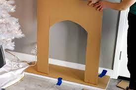 This is fun idea and kids will have so much fun with it. How To Make A Cardboard Holiday Fireplace Hgtv