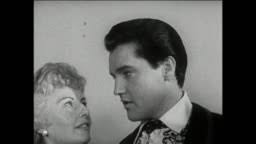 Elvis Presley make a charitable donation to the Motion Picture Relief...  Stock Footage Video