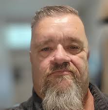 Local hair stylist for low messy updo in April