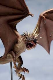 It has yellow eyes with vertical pupils. Hungarian Horntail Dragon Harry Potter Dragon Dragon Statue Dragon