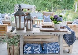 Dressing up your deck or patio is easy by adding some flowers and foliage. Easy Decorating Ideas For A Patio Makeover Sanctuary Home Decor
