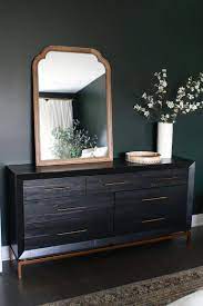Dark Green Guest Room With Boho Style The Diy Playbook Dark Wood Bedroom Wood Bedroom Furniture Wood Dresser Decor