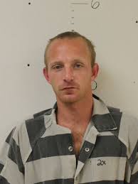 2 men accused of covering up killing