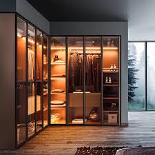 If your wardrobe sports sliding doors, consider fitting them with lacquered glass panels that'll reflect ambient light. Glass Wardrobe All Architecture And Design Manufacturers Videos