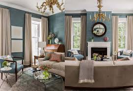These chicago homeowners used a pennant, fabric hangings, tassels, and other ephemera in the sweet, small composition on their pink living room wall. Should Curtains Match The Walls Or The Couch Answered Decor Snob
