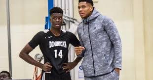 The boy's legs turn into scissors as he slices a basketball between them. Giannis Antetokounmpo Biography Age Wiki Height Weight Girlfriend Family More