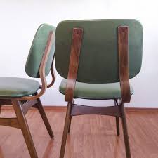 They are both beautiful and functional; Pair Of Midcentury Modern Dining Chairs Scandinavian Design Chairs Green Eco Leather 60s Retro Taste