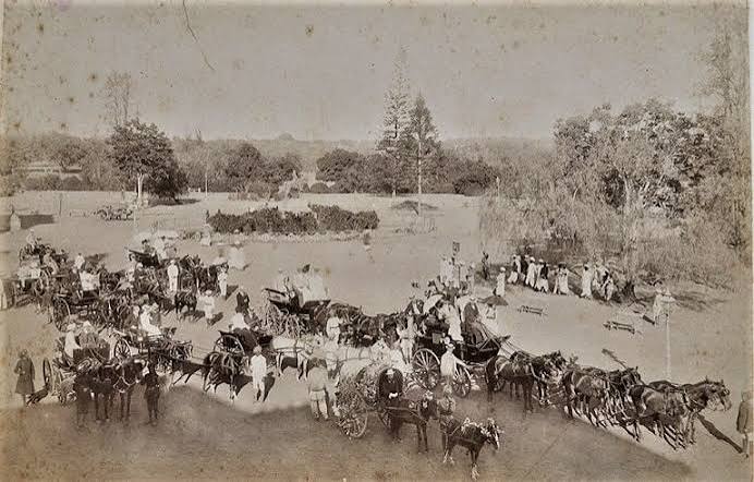 An old photographic image of an English 'memsahib' with some Indian ladies, British India, circa late 19th century. Can anyone please identify the location more precisely? Somebody told me it could be