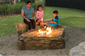 What kind of fire pit do you need for a deck? Waterfall Creations Offers Boulder Firepit Pool Spa News
