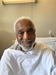 Hi, I would like to draw this as a portrait as a gift, but the photo is in  terrible condition. Could someone fix it? The photo is of a grandfather who  passed