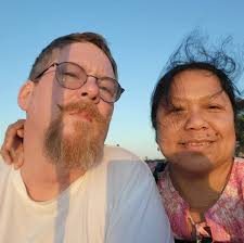 When signing for the bill in a restaurant at the resort is it customary to  tip