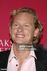 Jim Conte, Karen Jennings and Andrew Jennings, President of SAKS... News  Photo