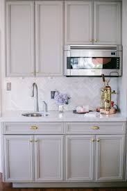 Look We Love Gray Kitchen Cabinets With Brass Hardware Home Kitchens Grey Kitchen Cabinets Kitchen Inspirations