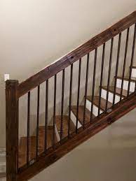 Rustic Old Utility Pole Cross Arms Reclaimed Into Stair Railing With Rebar Used As Spindles Rustic Stairs Rustic Staircase Interior Stair Railing