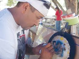 Local Tattoo Artist brings smiles to Oglala Nation