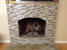 Around fireplace / ruetemple 09 nov 2019. Neptuno Gold Hearth With Escorial Blend Linear Glass Mosaic With Schluter System Eke Stainless Steel Profile Edging Fireplace Tile Mosaic Glass Fireplace