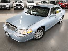 Image result for Light Ice Blue 2006 Town Car