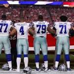 Cowboys, Cardinals lock arms for national anthem in show of unity 1