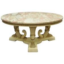 A rare and organic coffee or cocktail table. French Empire Neoclassical Cornucopia Base Round Pink Marble Top Coffee Table For Sale At 1stdibs