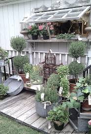 Galvanized Buckets Topiaries And Plant Ideas Love The Wooden Awning Villabarnes Gartengestaltung Gartendekoration Gartengestaltung Ideen