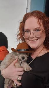 Such a hard job! Got morning snuggles with adorable pups up fpr adoption