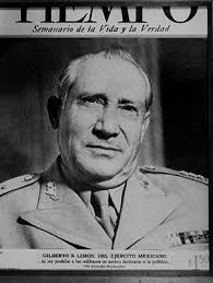 Gilberto R. Limón. general acompañado al parecer de su esposa durante un  evento