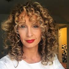 If you have an oval shaped face, then try short blunt bangs. 20 Most Incredible Curly Hairstyles With Bangs
