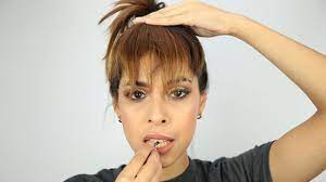 Then, place your pointer finger at the center of the front of your head and run it back in a straight line toward the base of your ponytail. 3 Ways To Fake Bangs Wikihow