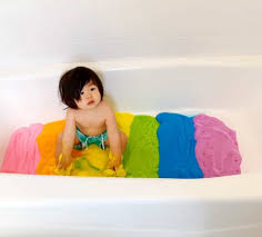 A baby bathtub will help you prop up a wriggling newborn. Rainbow Soap Foam Sensory Play Hello Wonderful