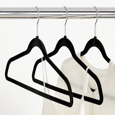 Pant hangers / skirt hangers with metal swivel hook for retail store display racks. Black Premium Non Slip Velvet Suit Hangers Case Of 40 The Container Store